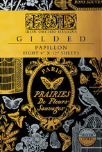 Gilded Papillon paper pack with floral and butterfly designs on a black background